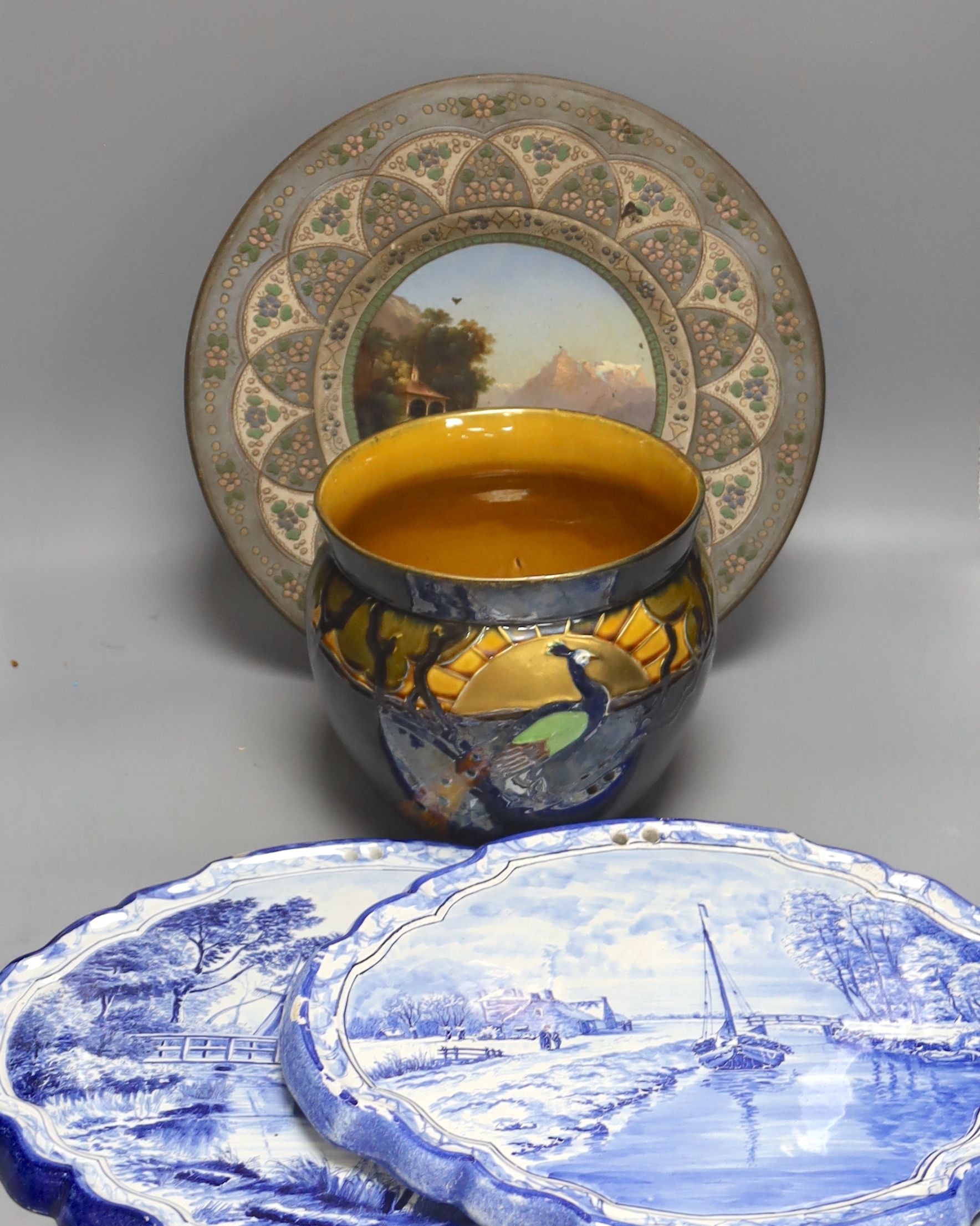 A Thoune, Swiss painted pottery dish, two Delft plaques and a Foresters jardiniere, largest 36cm